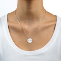 Engraved Initial Necklace with Special Date Engraved initial necklace with two initials and a special date on a round disc pendant