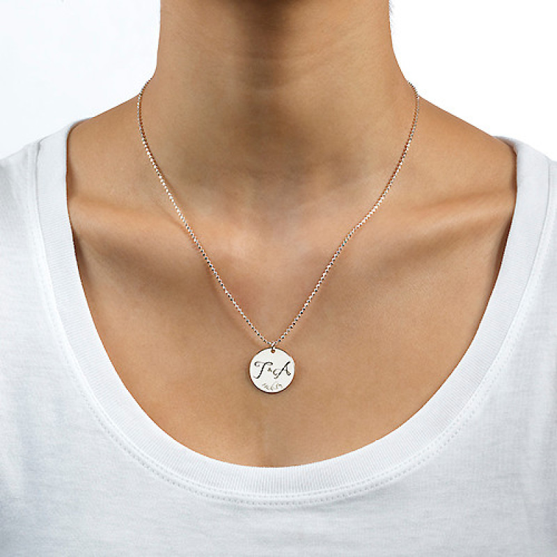 Engraved Initial Necklace with Special Date Engraved initial necklace with two initials and a special date on a round disc pendant