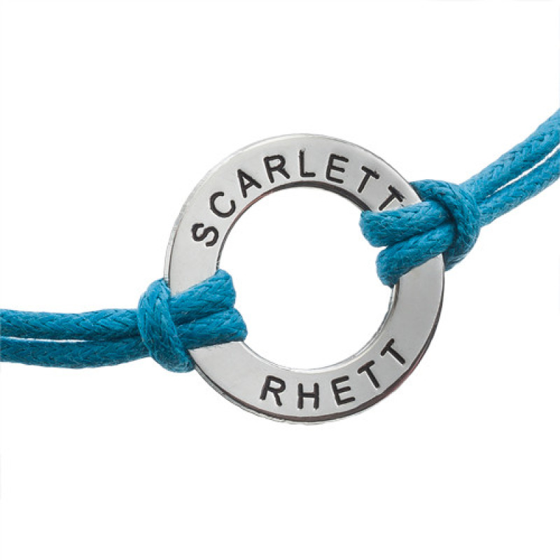 Personalised engraved coin bracelet or anklet with a leather-style cord