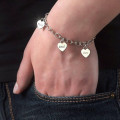 Personalised Heart Charm Bracelet Personalised heart charm bracelet with engraved heart pendants