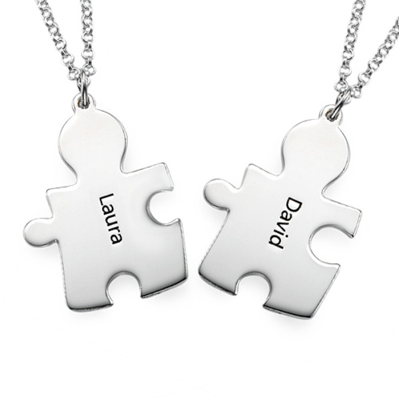 Personalised Silver Puzzle Necklace Personalised silver puzzle necklace with two engraved jigsaw piece pendants