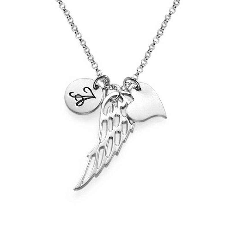 Sterling Silver Angel Wing Initial Necklace Sterling silver angel wing necklace with heart charm and initial pendant