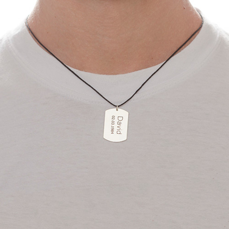 Sterling Silver Men's Personalised Dog Tag Necklace Sterling silver men's personalised dog tag name pendant on a leather cord