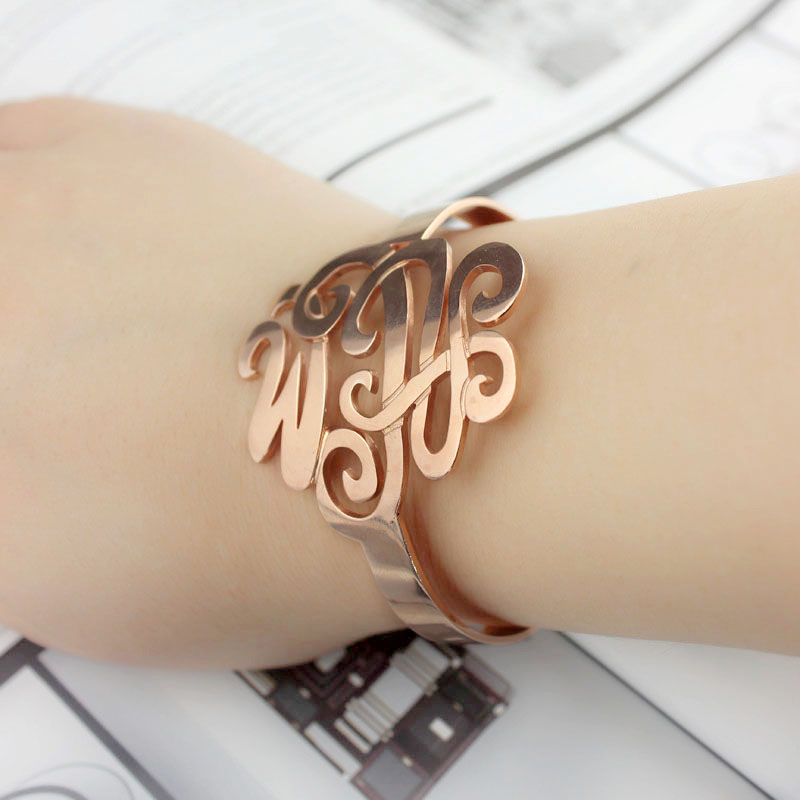 Hand-designed monogram cuff bracelet detail