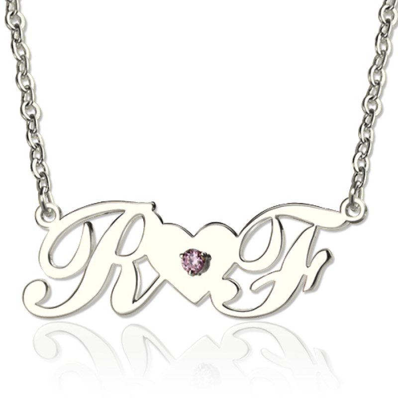 Sterling Silver Double Initials Heart Necklace Sterling silver double initials necklace with heart pendant