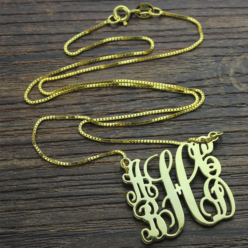 Scrolling family monogram necklace with five initials