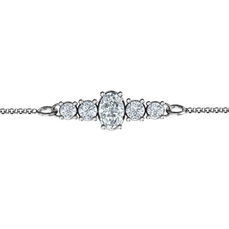 Personalised bracelet with an oval centre stone and four round side stones