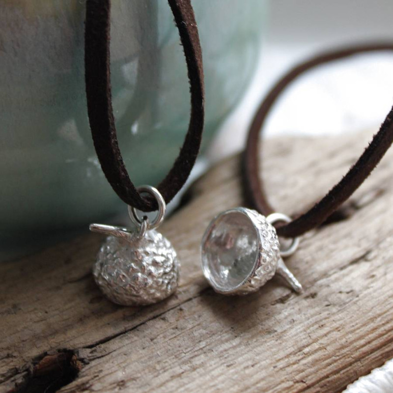Sterling silver acorn cup pendant on a leather cord