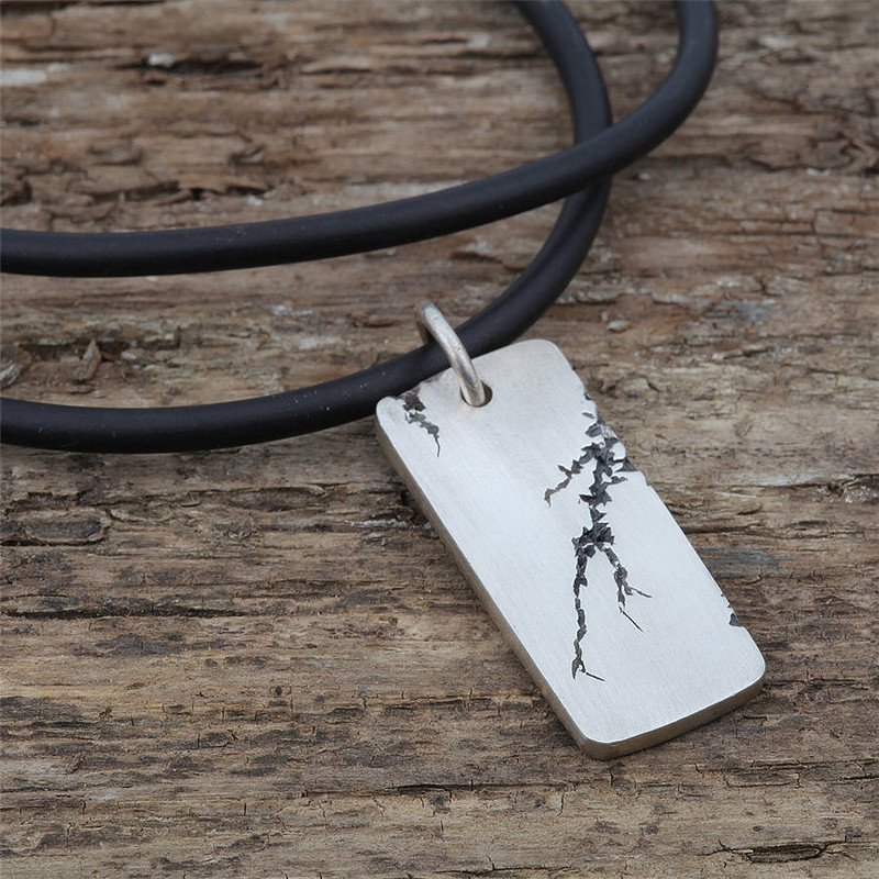 Men's Strike Silver Pendant Men's Strike pendant on a rubber length