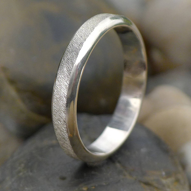 Diamond Cut Textured Sterling Silver Ring Diamond cut textured sterling silver ring with a 4 mm wide band