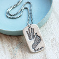 Personalised men's dog tag necklace with handprint and footprint design