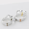 Linear Ring Linear Ring with a wide silver band and raised gold detail