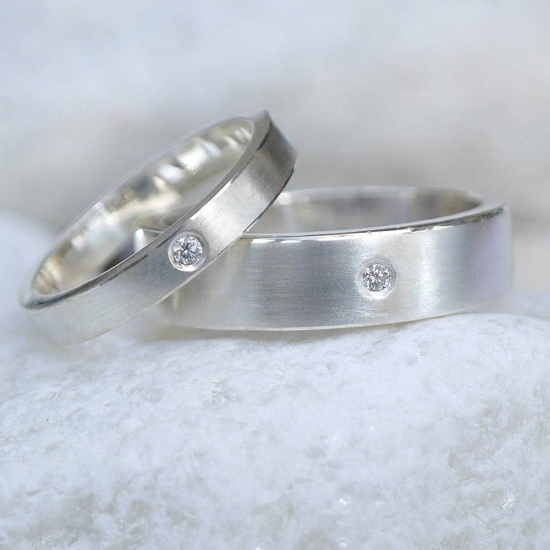 His and hers silver wedding rings product view