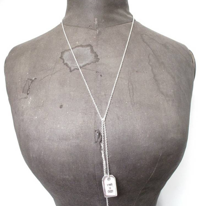 Fine silver label lariat necklace with crystal detail