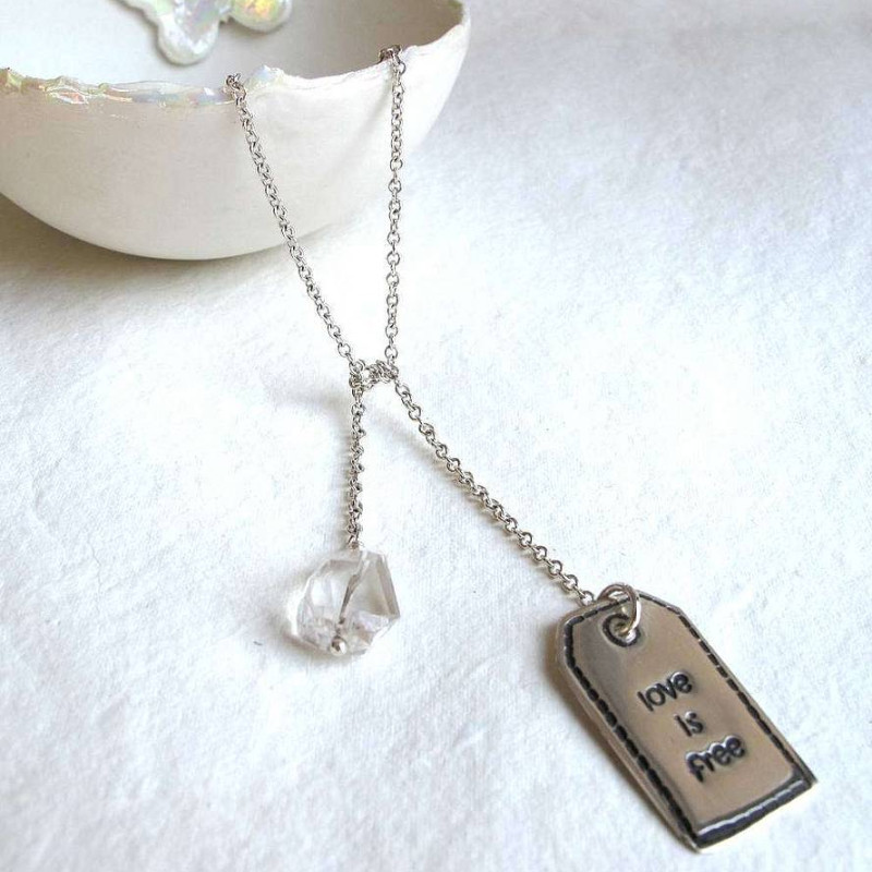 Fine silver label tag on lariat necklace