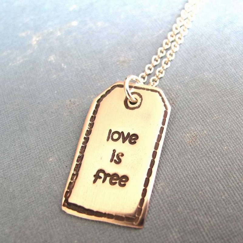 Fine silver designer label with Love Is Free wording
