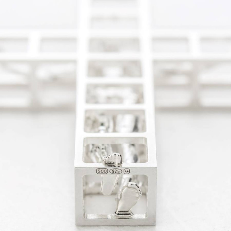 Man in a Cage micromachined pendant product image