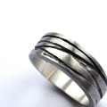 Silver Texture Bound Ring Angle Silver Texture Bound Ring angled view
