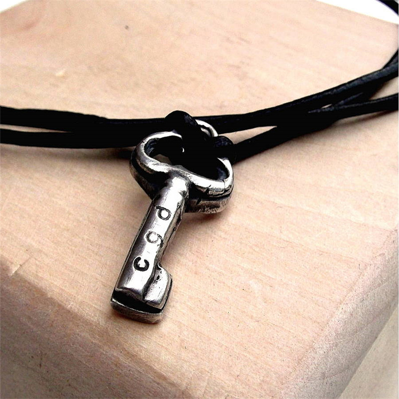 Personalised Silver Key Pendant Detail Personalised silver key pendant necklace detail