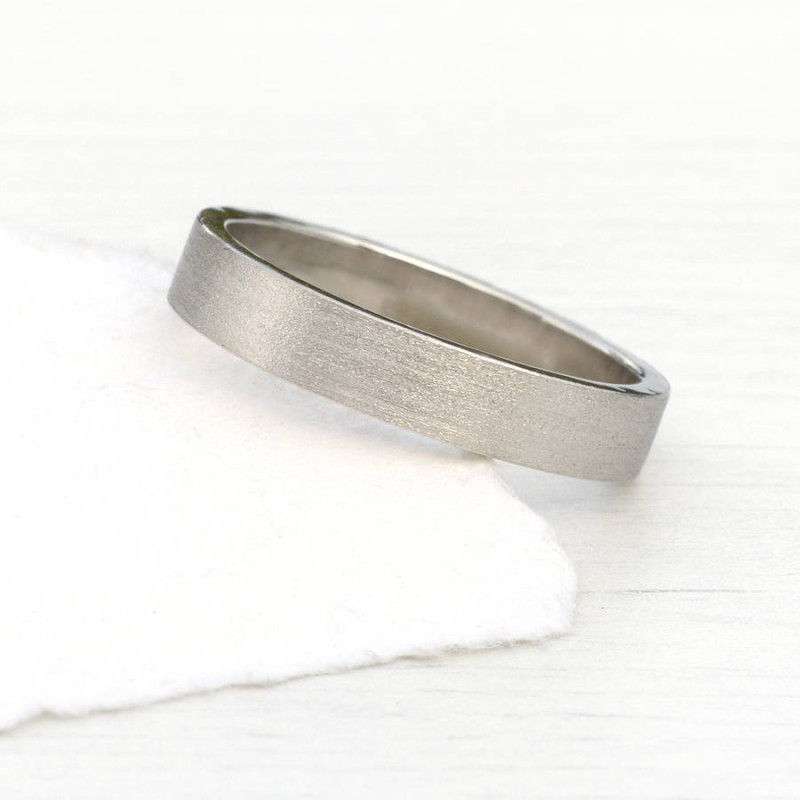 Wedding ring with spun silk finish