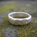 Rocky Outcrop Slim Ring Rocky Outcrop Slim Ring with a rock-like textured outer surface